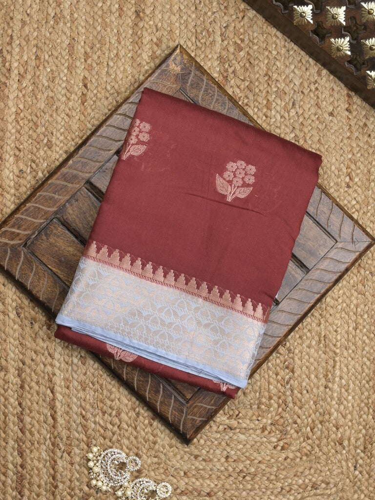 Maheshwari fancy saree with allover zari motifs & zari border with contrast blouse