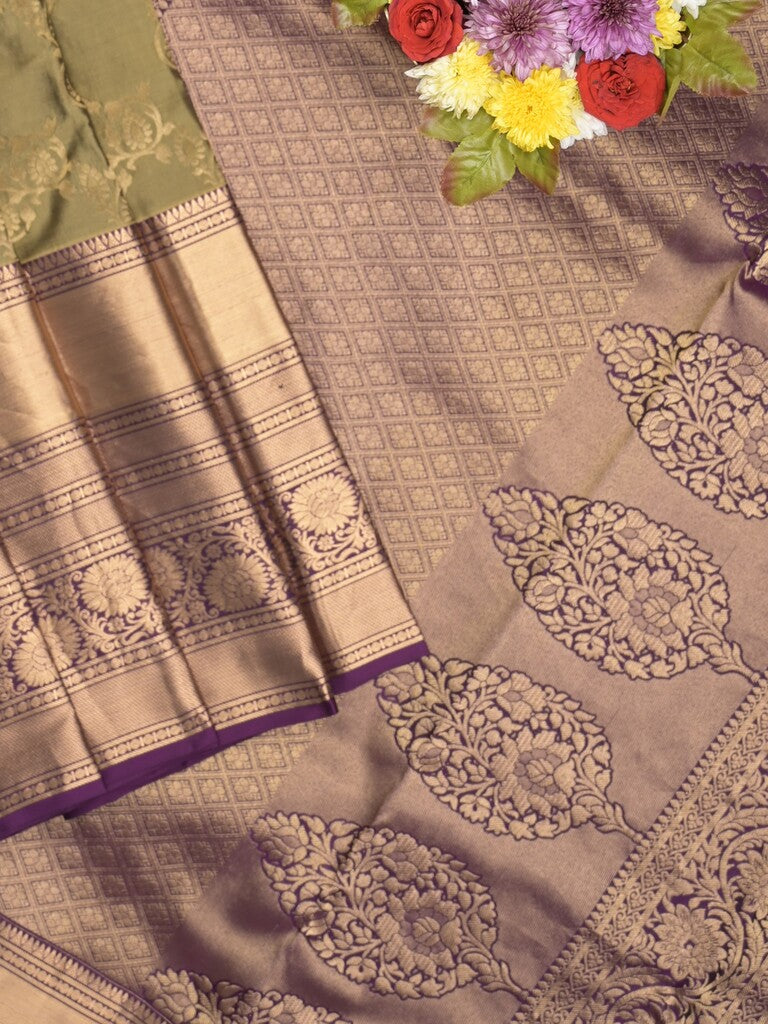 Kanchi pattu saree light olive green color allover zari weaves & zari border with rich pallu and contrast plain blouse