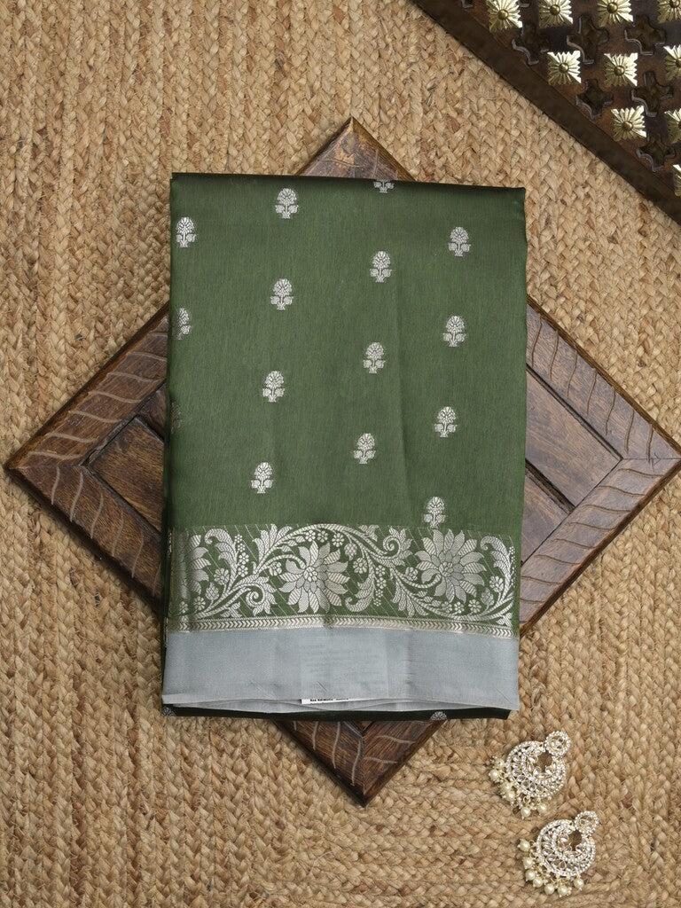Green mango fancy sarees with allover zari detailing and attached contrast blouse