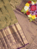 Kanchi pattu saree light olive green color allover zari weaves & zari border with rich pallu and contrast plain blouse
