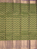 Kanchi pattu saree olive green color allover zari weaves & zari border with rich pallu and contrast plain blouse
