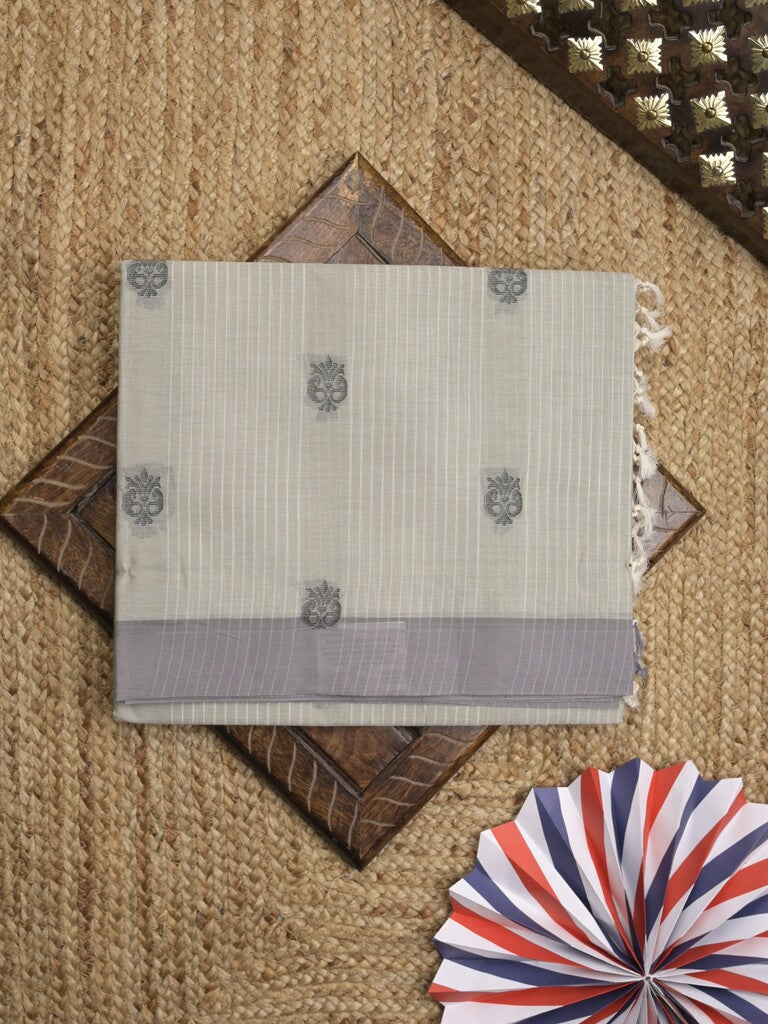 Kanchi cotton saree with allover motifs & contrast border with attached blouse