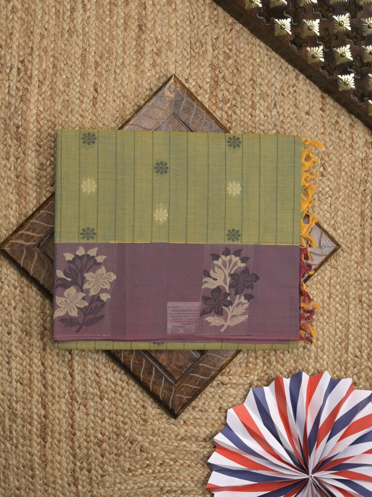 Kanchi cotton saree with allover motifs and contrast border paired with self-blouse