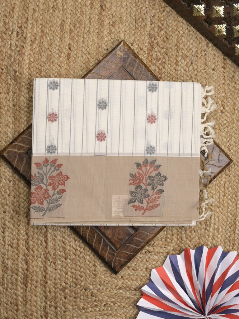 Kanchi cotton saree with allover motifs and contrast border paired with self-blouse