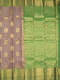 Kanchi pattu saree greyish purple color allover zari motifs & zari border with rich pallu and contrast plain blouse