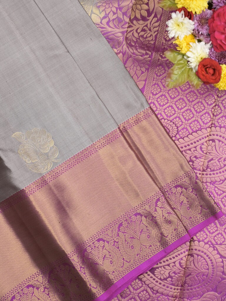 Kanchi pattu saree bluish grey color allover zari motifs & zari border with rich pallu and contrast plain blouse