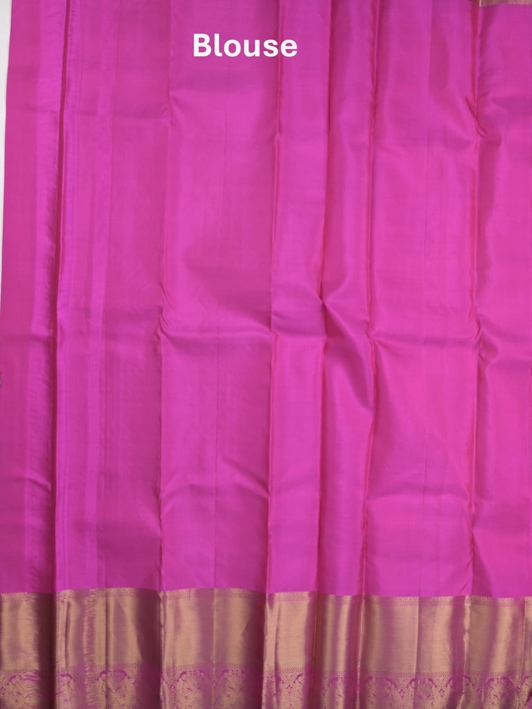 Kanchi pattu saree pinkish orange color allover zari motifs & zari border with rich pallu and contrast plain blouse