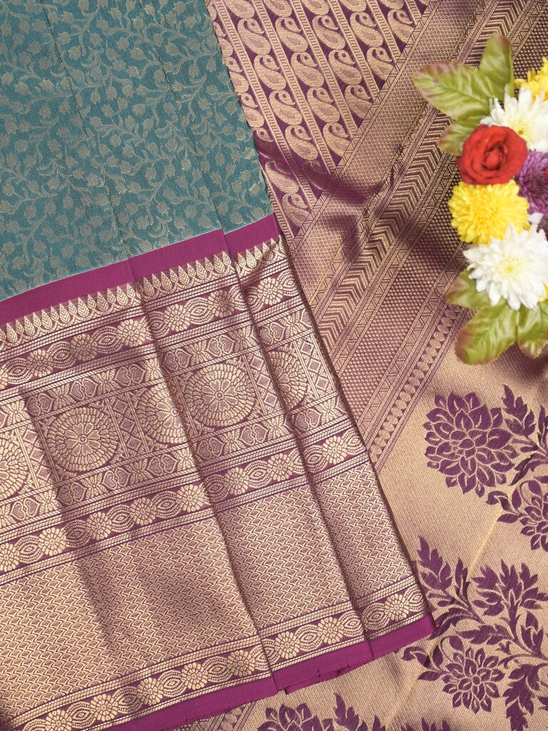 Kanchi pattu saree peacock blue color allover zari weaves & zari border with rich pallu and contrast plain blouse