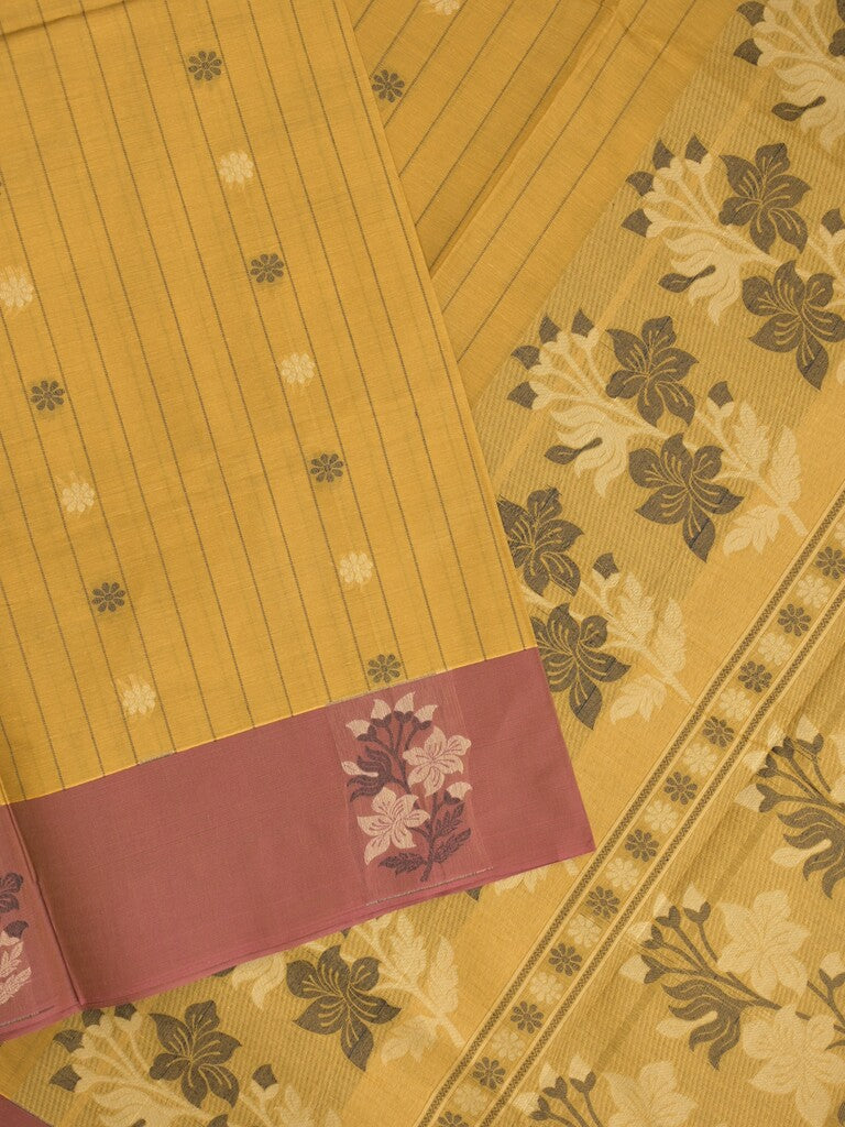 Kanchi cotton saree with allover motifs and contrast border paired with self-blouse