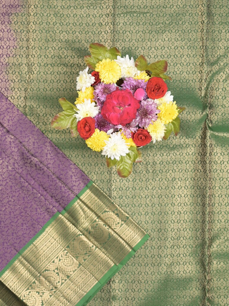 Kanchi pattu saree purple color allover zari weaves & zari border with rich pallu and contrast plain blouse