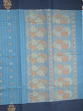 Kanchi cotton saree with allover motifs and contrast border paired with self-blouse