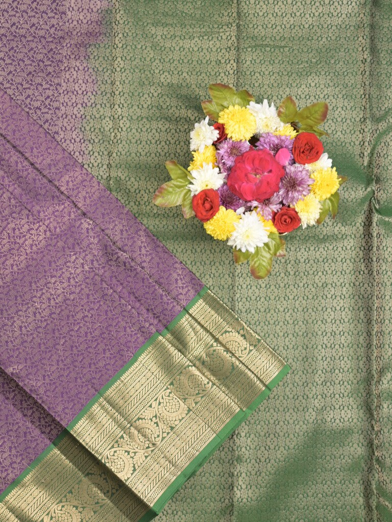 Kanchi pattu saree purple color allover zari weaves & zari border with rich pallu and contrast plain blouse