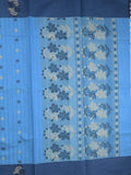 Kanchi cotton saree with allover motifs and contrast border paired with self-blouse