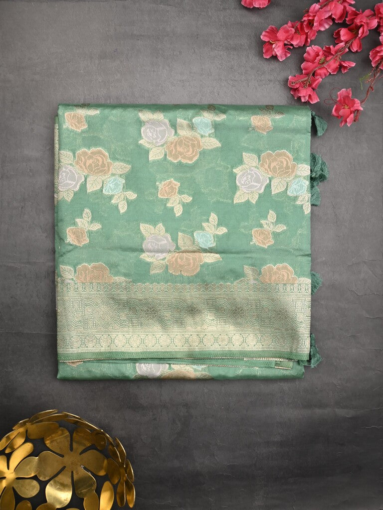 Dupion fancy saree lux green color allover weaves & zari border with zari pallu and plain self blouse