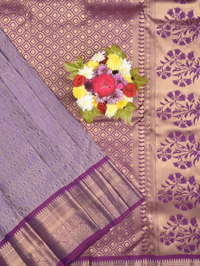 Kanchi pattu saree light purple color allover zari weaves & zari border with rich pallu and contrast plain blouse