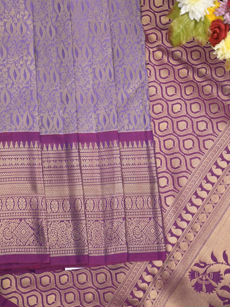 Kanchi pattu saree light purple color allover zari weaves & zari border with rich pallu and contrast plain blouse