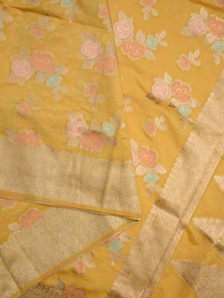 Dupion fancy saree yellow color allover weaves & zari border with zari pallu and plain self blouse