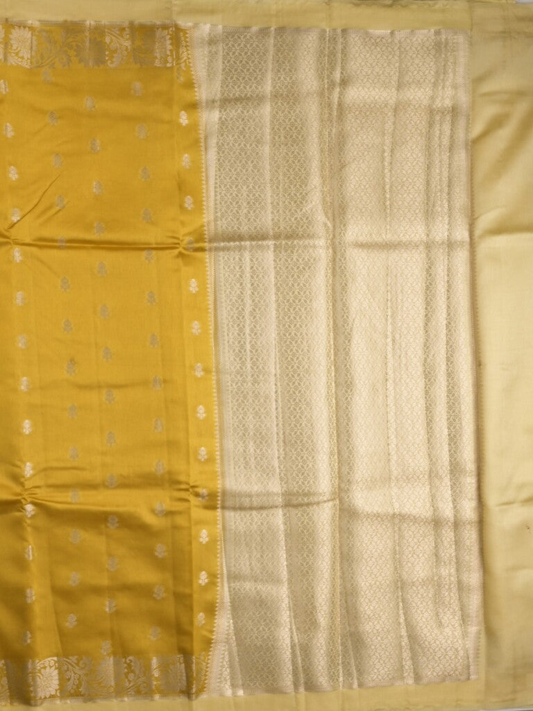Green mango fancy sarees with allover zari detailing and attached contrast blouse