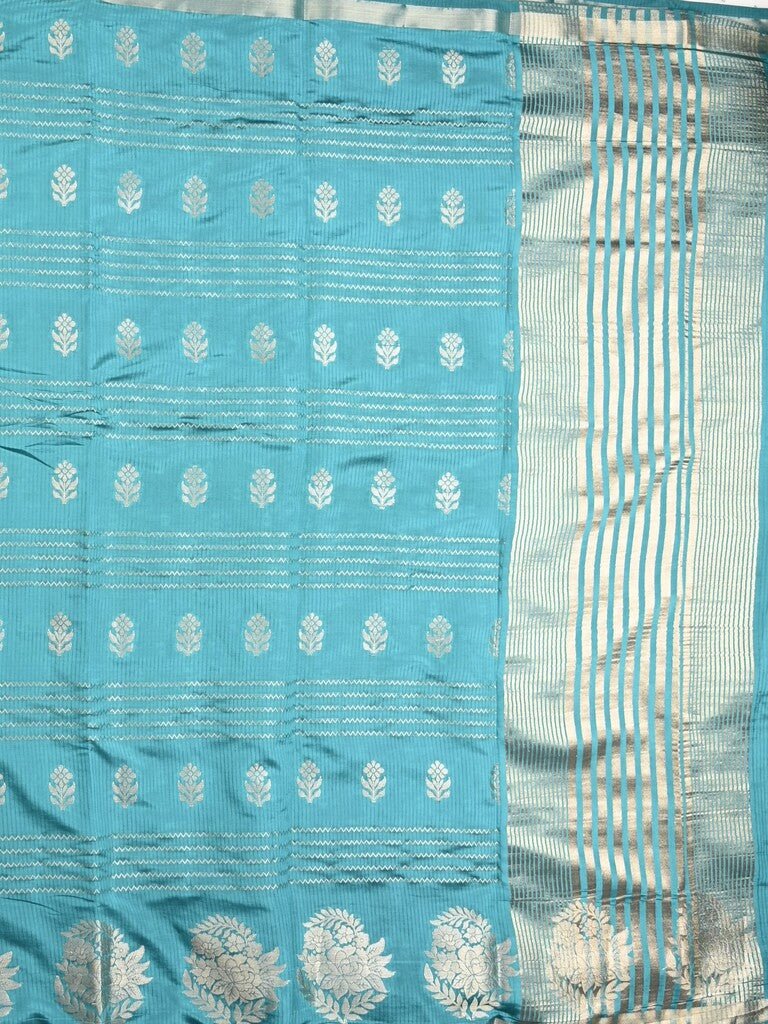 Dupion fancy saree sky blue color allover weaves & zari border with zari pallu and contrast blouse
