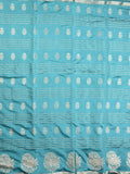Dupion fancy saree sky blue color allover weaves & zari border with zari pallu and contrast blouse
