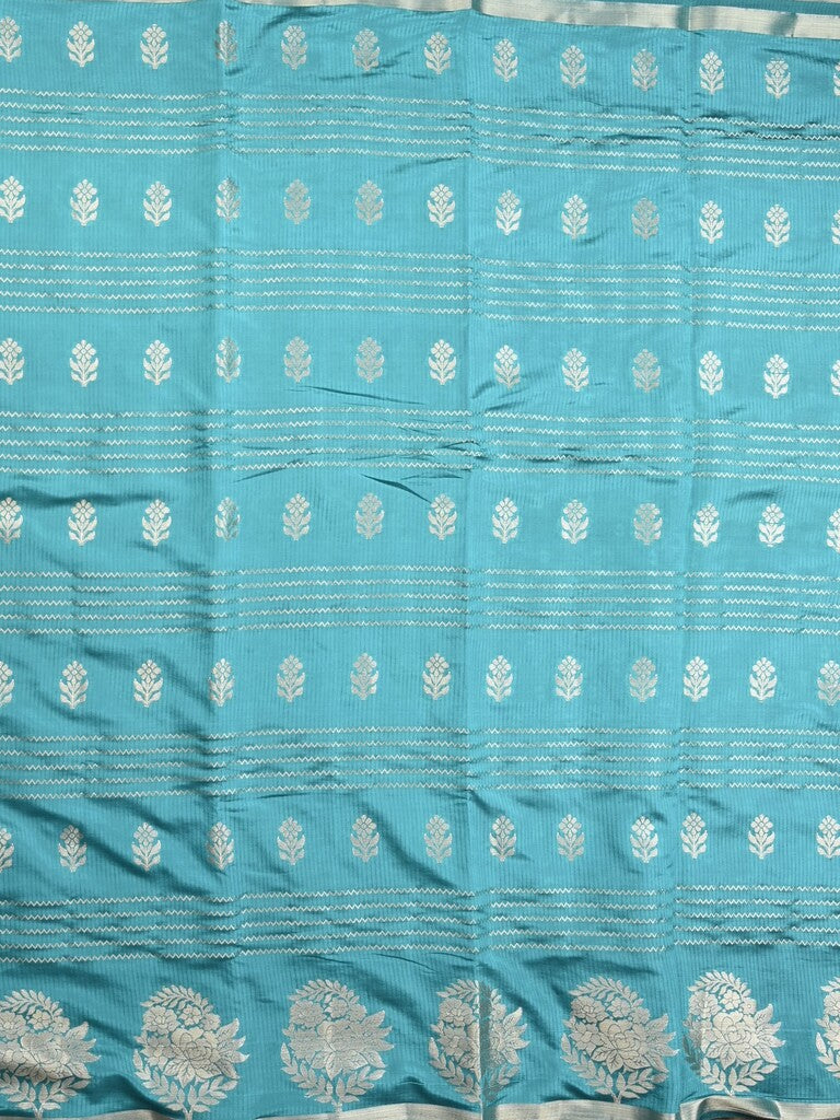 Dupion fancy saree sky blue color allover weaves & zari border with zari pallu and contrast blouse