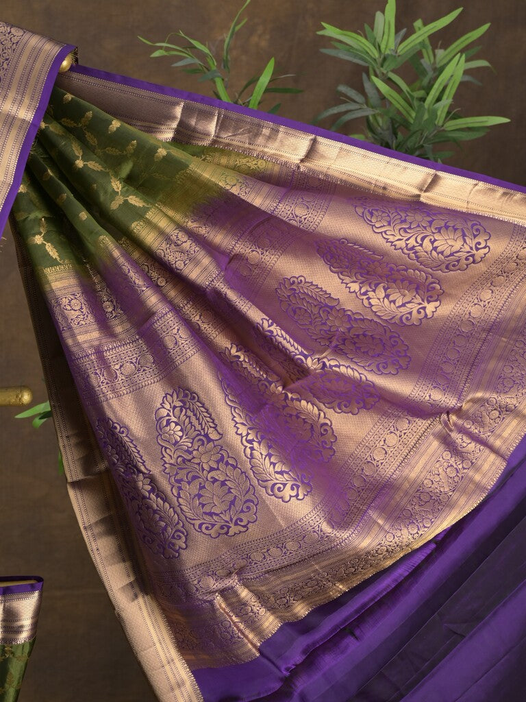 Kanchi pattu saree olive green color allover zari weaves & zari border with rich pallu and contrast plain blouse