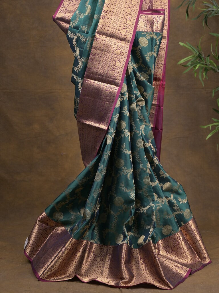 Kanchi pattu saree peacock blue color allover zari weaves & zari border with rich pallu and contrast plain blouse