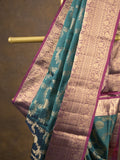 Kanchi pattu saree peacock blue color allover zari weaves & zari border with rich pallu and contrast plain blouse