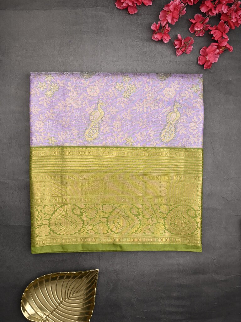 Kanchi tissue pattu saree light lavender color allover zari weaves & kanchi border with rich pallu and contrast tissue blouse