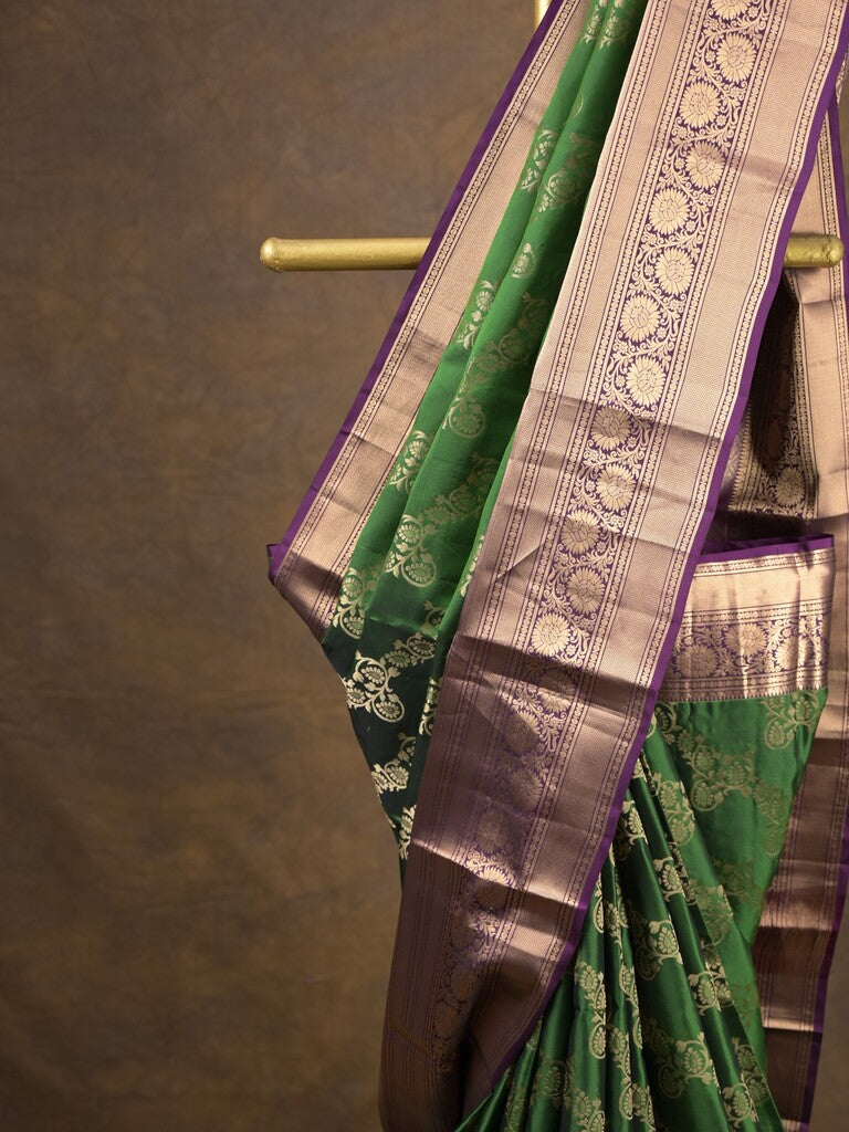 Kanchi pattu saree bottle green color allover zari weaves & zari border with rich pallu and contrast plain blouse