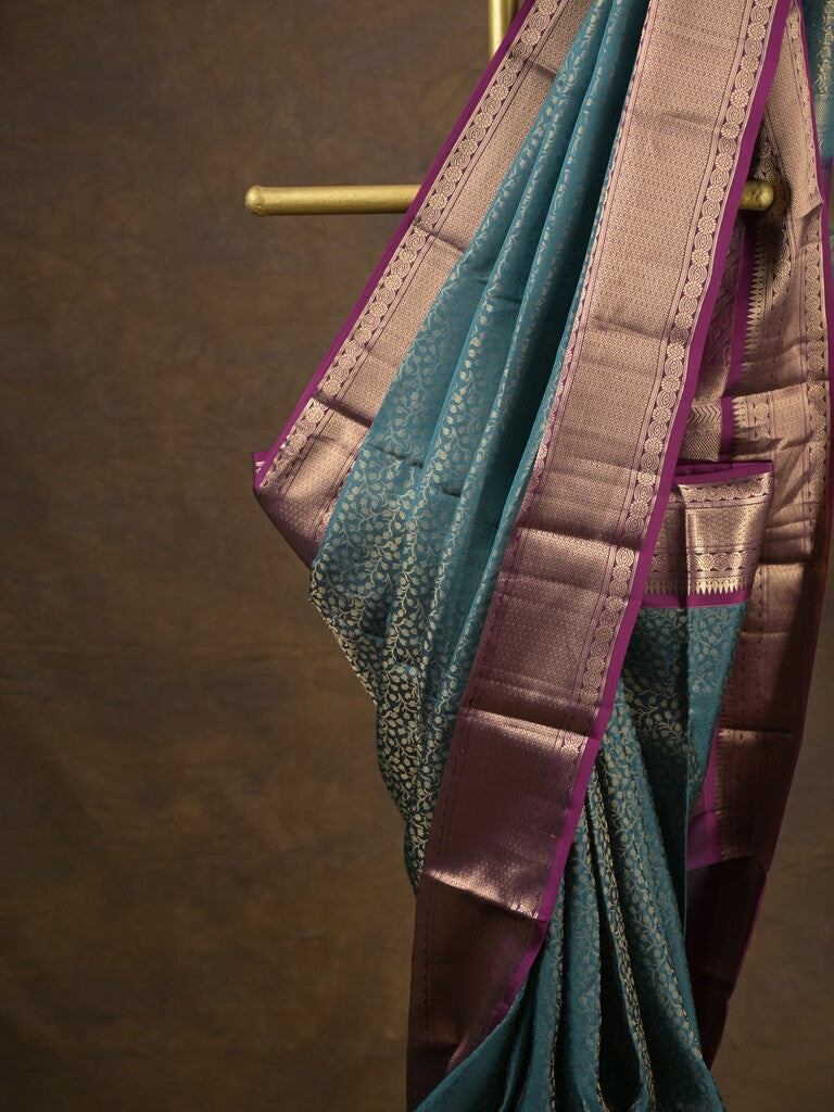Kanchi pattu saree peacock blue color allover zari weaves & zari border with rich pallu and contrast plain blouse
