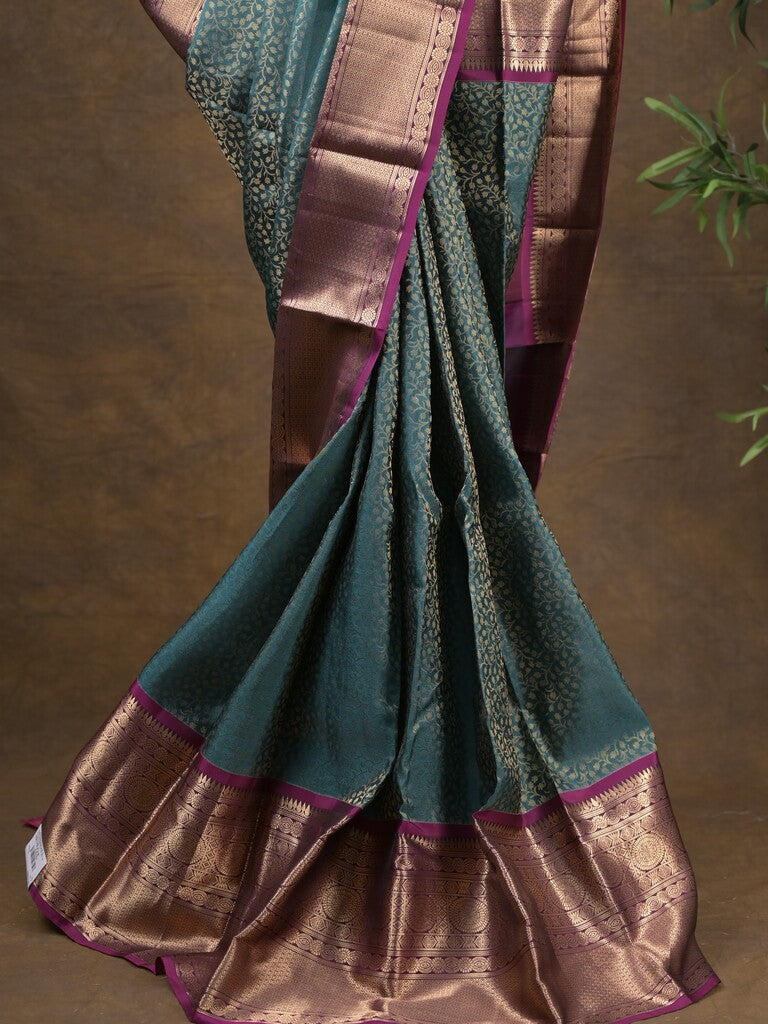 Kanchi pattu saree peacock blue color allover zari weaves & zari border with rich pallu and contrast plain blouse