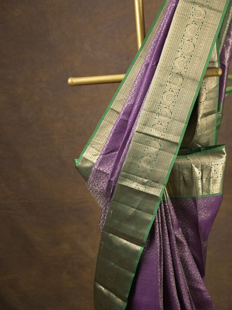 Kanchi pattu saree purple color allover zari weaves & zari border with rich pallu and contrast plain blouse