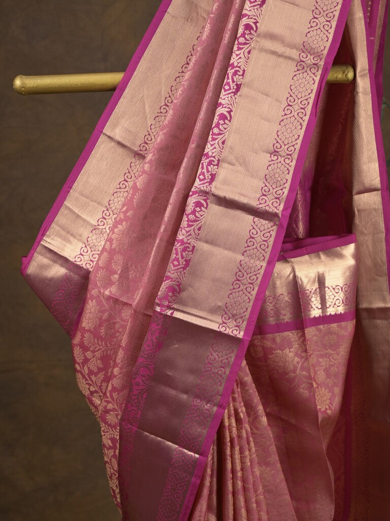 Kanchi pattu saree onion pink color allover zari weaves & zari border with rich pallu and contrast plain blouse