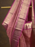 Kanchi pattu saree onion pink color allover zari weaves & zari border with rich pallu and contrast plain blouse