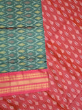Ikkat pattu saree peacock green color allover weaves & zari border with contrast pallu and contrast blouse