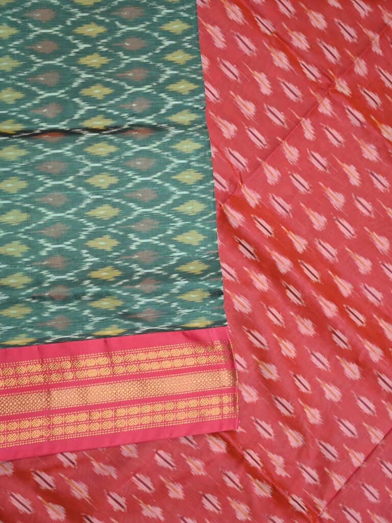 Ikkat pattu saree peacock green color allover weaves & zari border with contrast pallu and contrast blouse