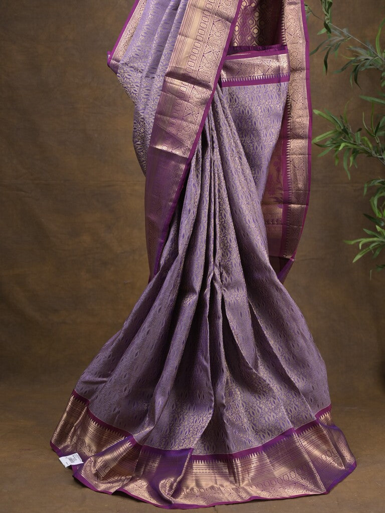 Kanchi pattu saree light purple color allover zari weaves & zari border with rich pallu and contrast plain blouse