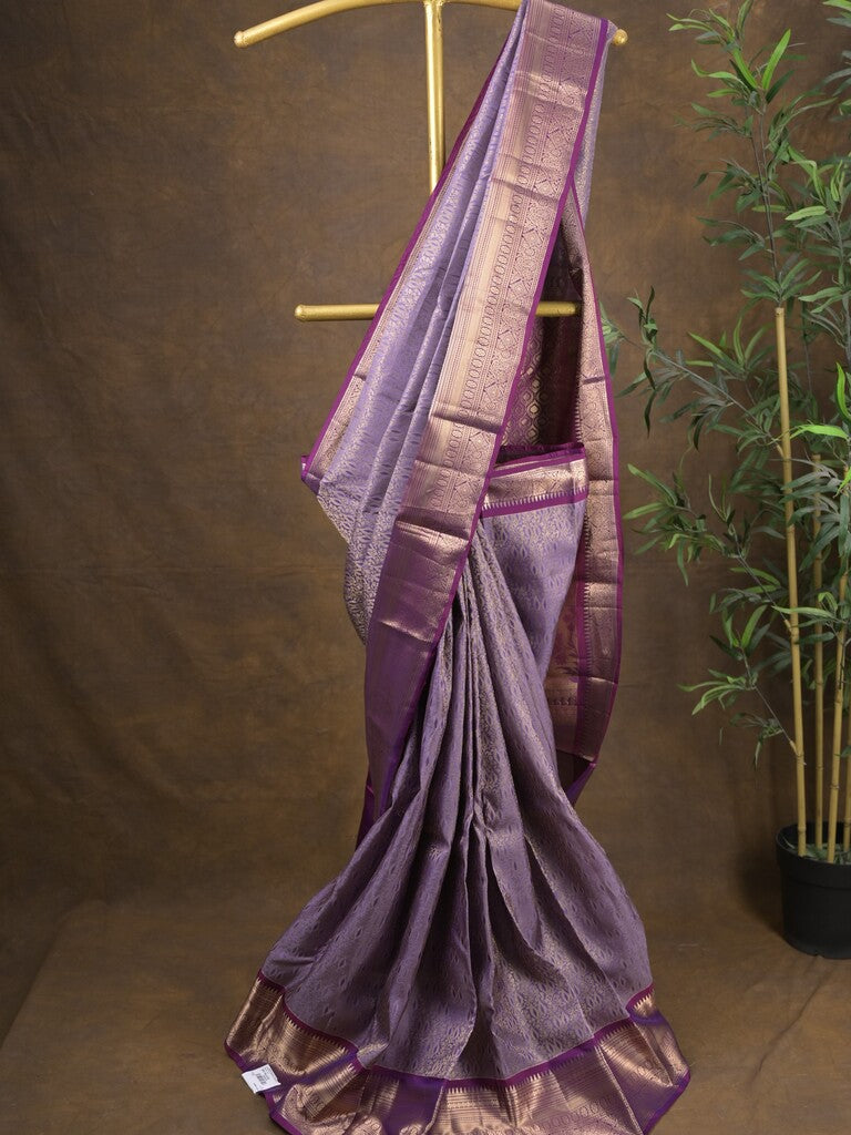 Kanchi pattu saree light purple color allover zari weaves & zari border with rich pallu and contrast plain blouse