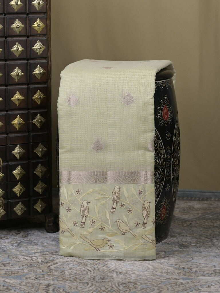 Chanderi fancy saree light pista green color allover zari motifs & zari border with brocade pallu and attached plain blouse