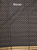 Dola silk fancy saree black color allover prints & zari border with printed pallu and plain blouse