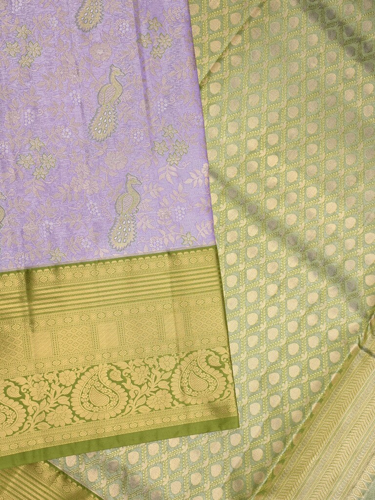 Kanchi tissue pattu saree light lavender color allover zari weaves & kanchi border with rich pallu and contrast tissue blouse