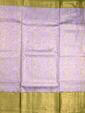 Kanchi tissue pattu saree light lavender color allover zari weaves & kanchi border with rich pallu and contrast tissue blouse