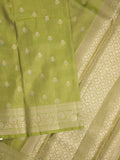 Organza tissue fancy saree parrot green color allover zari weaves & zari border with brocade pallu and attached brocade blouse
