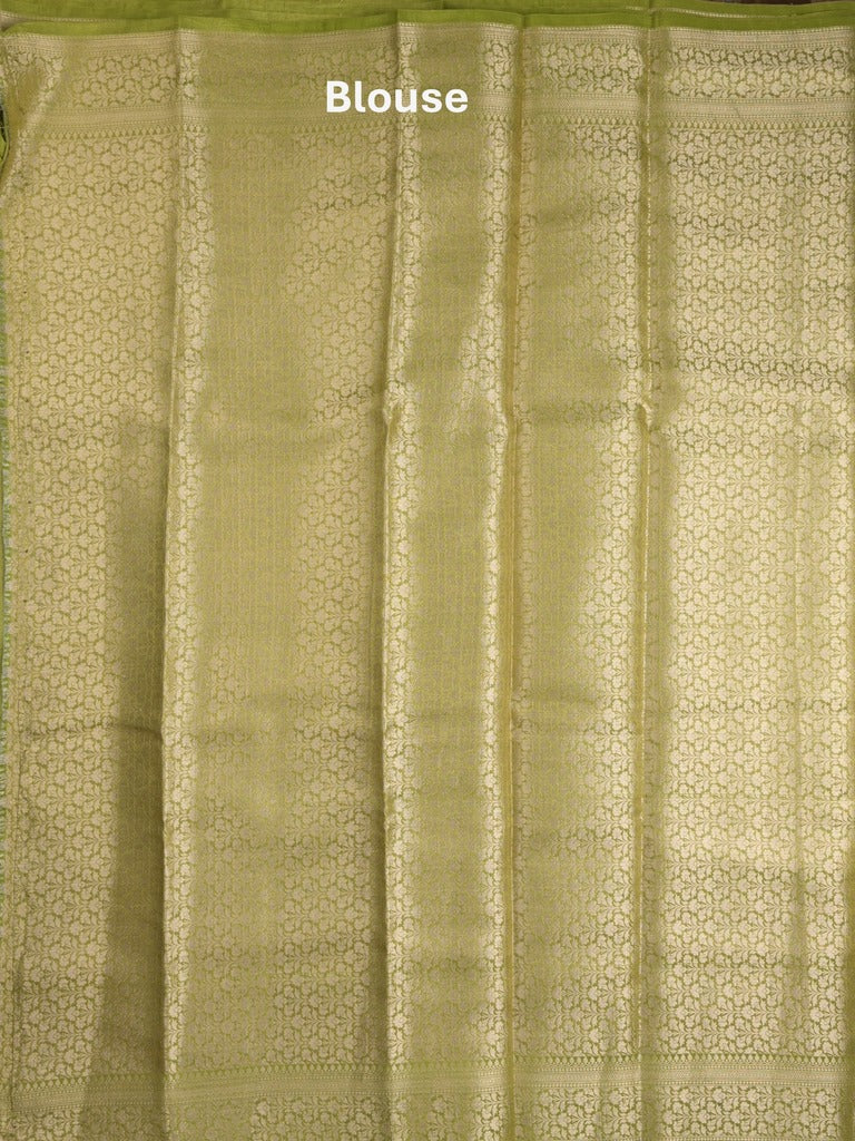 Organza tissue fancy saree parrot green color allover zari weaves & zari border with brocade pallu and attached brocade blouse