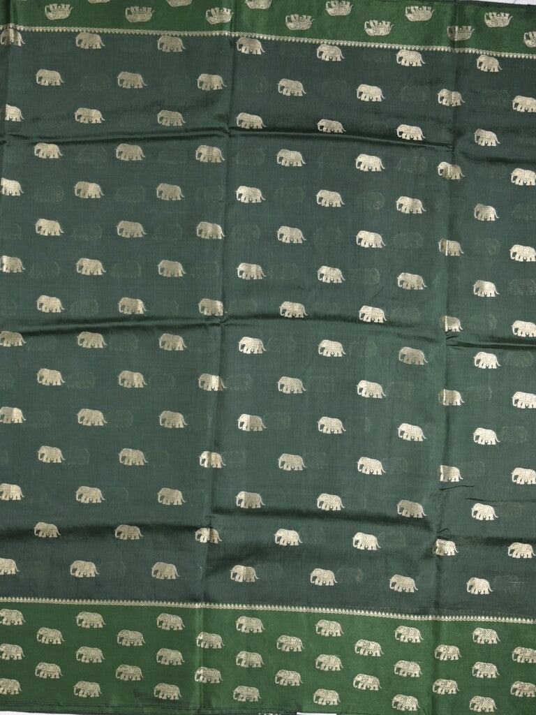 Raw mango fancy saree dark green color allover zari motifs & zari border with brocade pallu and contrast plain blouse