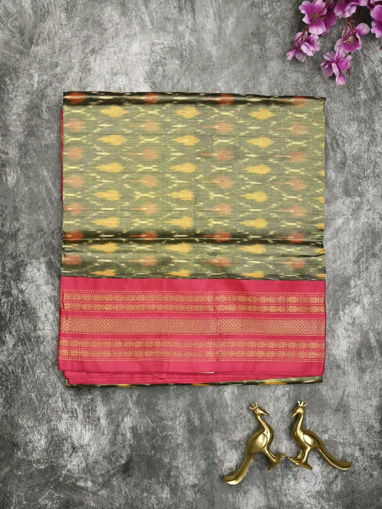 Ikkat pattu saree snuff color allover weaves & zari border with contrast pallu and contrast blouse