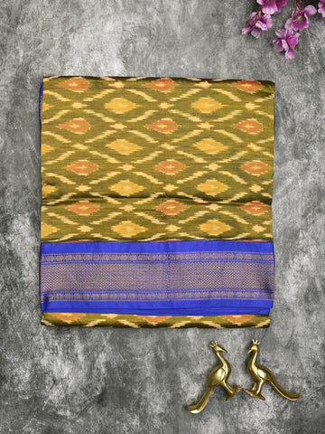 Ikkat pattu saree olive green color allover weaves & zari border with contrast pallu and contrast blouse