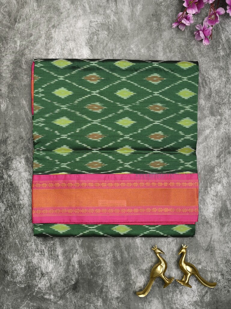 Ikkat pattu saree bottle green color allover weaves & zari border with contrast pallu and contrast blouse