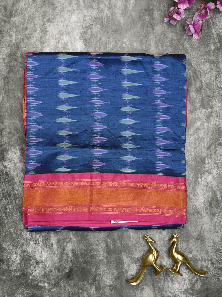 Ikkat pattu saree royal blue color allover weaves & zari border with contrast pallu and contrast blouse